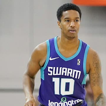 Dec 22, 2022; Las Vegas, NV, USA; Greensboro Swarm guard Ty-Shon Alexander (10) dribbles the ball against NBA G League Ignite  during the second half at Mandalay Bay Convention Center. Mandatory Credit: Lucas Peltier-Imagn Images