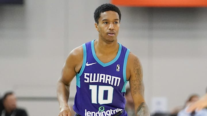 Dec 22, 2022; Las Vegas, NV, USA; Greensboro Swarm guard Ty-Shon Alexander (10) dribbles the ball against NBA G League Ignite  during the second half at Mandalay Bay Convention Center. Mandatory Credit: Lucas Peltier-Imagn Images