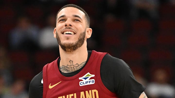 Oct 9, 2025; Chicago, Illinois, USA; Cleveland Cavaliers guard Lonzo Ball (2) smiles while in action against the Chicago Bulls during the first half at United Center. Mandatory Credit: Patrick Gorski-Imagn Images