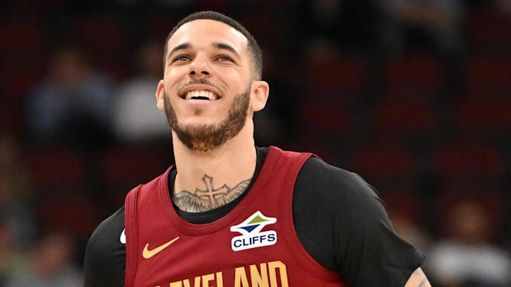 Oct 9, 2025; Chicago, Illinois, USA; Cleveland Cavaliers guard Lonzo Ball (2) smiles while in action against the Chicago Bulls during the first half at United Center. Mandatory Credit: Patrick Gorski-Imagn Images