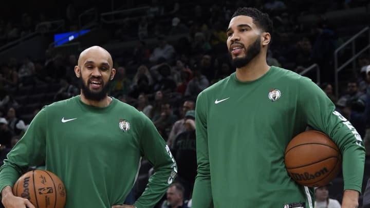 Apr 11, 2024; Boston, Massachusetts, USA;  Boston Celtics guard Derrick White (9) and forward Jayson Tatum (0) before a game against the New York Knicks at TD Garden. Mandatory Credit: Bob DeChiara-USA TODAY Sports