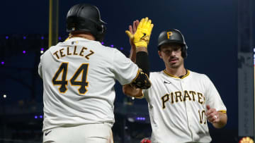 Jul 22, 2024; Pittsburgh, Pennsylvania, USA;  Pittsburgh Pirates first baseman Rowdy Tellez (44) greets left fielder Bryan Reynolds (10) crossing home plate with the game winning run to defeat the St. Louis Cardinals during the eighth inning at PNC Park. Pittsburgh won 2-1. Mandatory Credit: Charles LeClaire-USA TODAY Sports