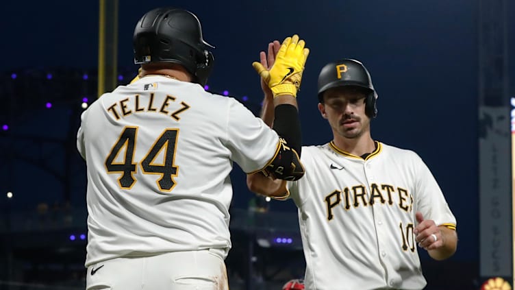 Jul 22, 2024; Pittsburgh, Pennsylvania, USA;  Pittsburgh Pirates first baseman Rowdy Tellez (44) greets left fielder Bryan Reynolds (10) crossing home plate with the game winning run to defeat the St. Louis Cardinals during the eighth inning at PNC Park. Pittsburgh won 2-1. Mandatory Credit: Charles LeClaire-USA TODAY Sports