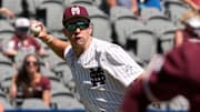 Mississippi State third baseman Ace Reese (3) fields a bunt by Texas A&M second baseman Ben Royo (10) but makes a wild throw to first in the first round of the SEC Baseball Tournament at the Hoover Met.