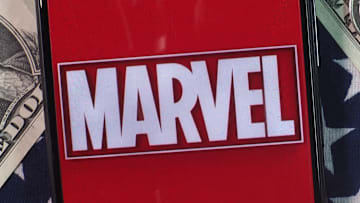 In this photo illustration, Marvel Entertainment logo seen...