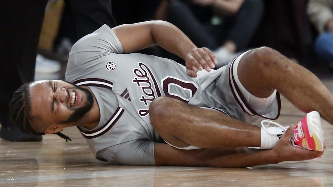 Mississippi State Bulldogs guard Jayden Epps (10) reacts as he grabs his ankle during the second half against the Alabama Crimson Tide at Humphrey Coliseum in Starkville, Miss.