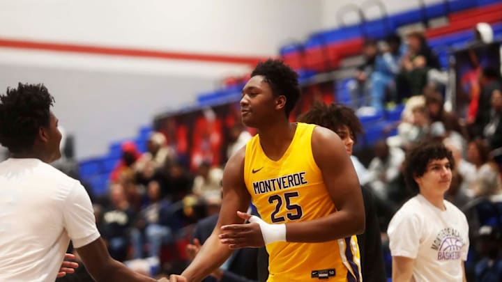 Montverde   s Derik Queen (25) shakes teammate hand during introductions against Whitehaven for a basketball game in the Winter Classic at the McDonald Insurance Arena on Friday, Feb. 09, 2024 in Bartlett, Tenn.