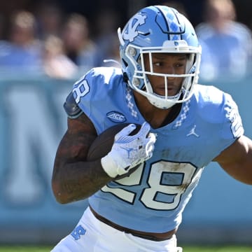 North Carolina could be a target for the Big Ten in football realignment over Clemson and Florida State, according to Paul Finebaum's view of things.