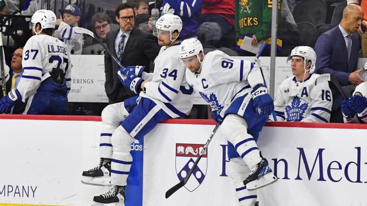 Jan 8, 2023; Philadelphia, Pennsylvania, USA; Toronto Maple Leafs center Auston Matthews (34) and center John Tavares (91) leave the bench as they celebrate win against the Philadelphia Flyers at Wells Fargo Center. Mandatory Credit: Eric Hartline-USA TODAY Sports