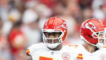 Aug 9, 2025; Glendale, Arizona, USA; Kansas City Chiefs offensive tackle Josh Simmons (71) against the Arizona Cardinals during a preseason NFL game at State Farm Stadium. Mandatory Credit: Mark J. Rebilas-Imagn Images