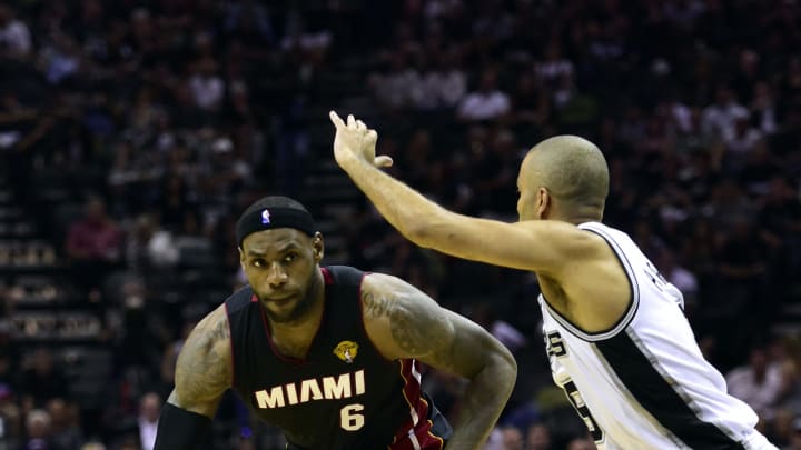 Jun 15, 2014; San Antonio, TX, USA; Miami Heat forward LeBron James (6) drives to the basket against San Antonio Spurs guard Tony Parker (9) during the third quarter in game five of the 2014 NBA Finals at AT&T Center. Mandatory Credit: Bob Donnan-USA TODAY Sports