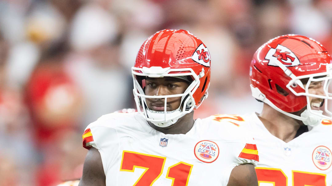 Aug 9, 2025; Glendale, Arizona, USA; Kansas City Chiefs offensive tackle Josh Simmons (71) against the Arizona Cardinals during a preseason NFL game at State Farm Stadium. Mandatory Credit: Mark J. Rebilas-Imagn Images