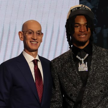 Jun 26, 2024; Brooklyn, NY, USA; Stephon Castle poses for photos with NBA commissioner Adam Silver after being selected in the first round by the San Antonio Spurs in the 2024 NBA Draft at Barclays Center.