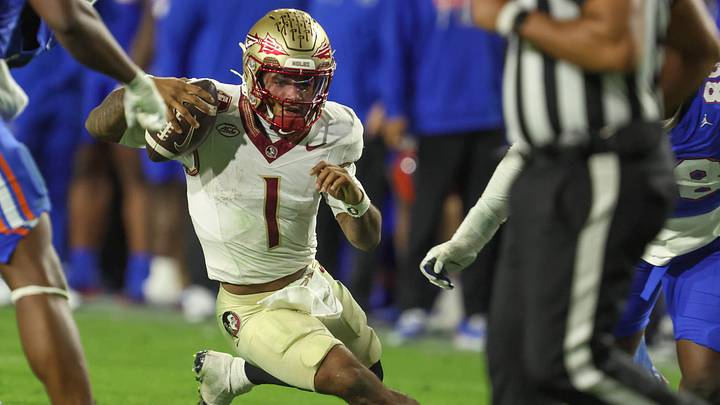 Florida State quarterback Tommy Castellanos (1) gets chased down during the second half of an NCAA football game at Steve Spurrier Field at Ben Hill Griffin Stadium in Gainesville, FL on Saturday, November 29, Florida beat Florida State 40-21.2025. [Alan Youngblood/Gainesville Sun]