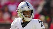 Oct 19, 2025; Kansas City, Missouri, USA; Las Vegas Raiders quarterback Geno Smith (7) drops back to pass during the second half against the Kansas City Chiefs at GEHA Field at Arrowhead Stadium. Mandatory Credit: Jay Biggerstaff-Imagn Images