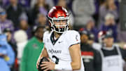 Nov 23, 2024; Manhattan, Kansas, USA; Cincinnati Bearcats quarterback Brendan Sorsby (2) drops back to pass during the first quarter against the Kansas State Wildcats at Bill Snyder Family Football Stadium. Mandatory Credit: Scott Sewell-Imagn Images