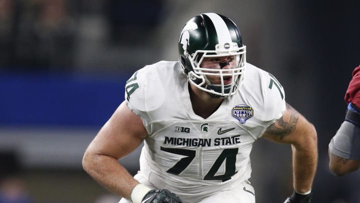 Dec 31, 2015; Arlington, TX, USA; Michigan State Spartans tackle Jack Conklin (74) in action against Alabama Crimson Tide in the second half of the 2015 CFP semifinal at the Cotton Bowl at AT&T Stadium. Mandatory Credit: Matthew Emmons-USA TODAY Sports