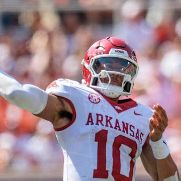 Arkansas Razorbacks quarterback Taylen Green (10) passes during the third quarter against the Oklahoma State Cowboys at Boone Pickens Stadium. 