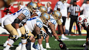 Sep 23, 2023; Salt Lake City, Utah, USA; UCLA Bruins offense lines up against the Utah Utes defense in the fourth quarter at Rice-Eccles Stadium. Mandatory Credit: Rob Gray-Imagn Images