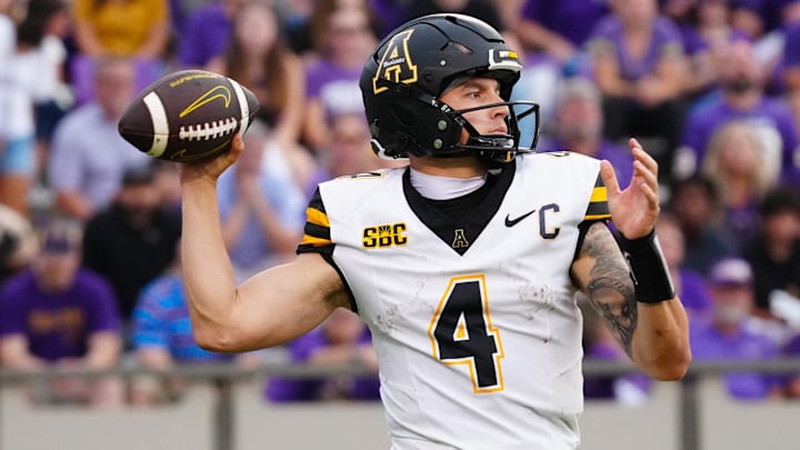 Sep 14, 2024; Greenville, North Carolina, USA;  Appalachian State Mountaineers quarterback Joey Aguilar (4) goes to throw the ball against the East Carolina Pirates during the second half at Dowdy-Ficklen Stadium. Mandatory Credit: James Guillory-Imagn Images