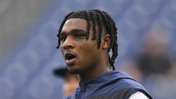  Dec 28, 2025; Nashville, Tennessee, USA;  Tennessee Titans quarterback Cam Ward (1) warms up prior to the game against the New Orleans Saints at Nissan Stadium. Mandatory Credit: Steve Roberts-Imagn Images