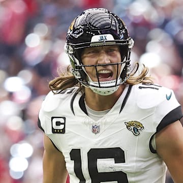 Nov 26, 2023; Houston, Texas, USA; Jacksonville Jaguars quarterback Trevor Lawrence (16) reacts after a touchdown during the third quarter against the Houston Texans at NRG Stadium. Mandatory Credit: Troy Taormina-Imagn Images