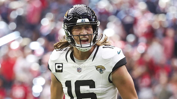 Nov 26, 2023; Houston, Texas, USA; Jacksonville Jaguars quarterback Trevor Lawrence (16) reacts after a touchdown during the third quarter against the Houston Texans at NRG Stadium. Mandatory Credit: Troy Taormina-Imagn Images