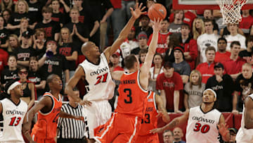 Cincinnati Bearcats James White tries to block a shot by Syracuse Orange Gerry McNamara in the second half. The Syracuse Orange defeated the Cincinnati Bearcats 77-58 at Fifth Third Arena.