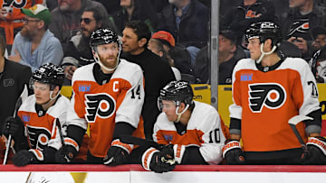 Apr 15, 2025; Philadelphia, Pennsylvania, USA; Philadelphia Flyers right wing Matvei Michkov (39), center Sean Couturier (14), right wing Bobby Brink (10) and right wing Tyson Foerster (71) watch the final seconds of loss to the Columbus Blue Jackets during the third period at Wells Fargo Center.