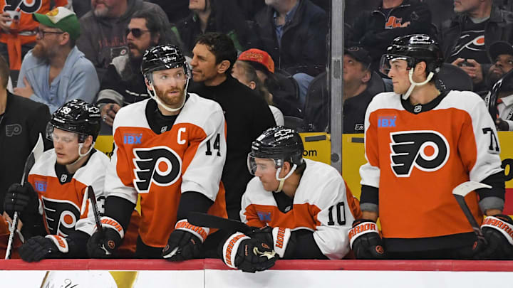 Apr 15, 2025; Philadelphia, Pennsylvania, USA; Philadelphia Flyers right wing Matvei Michkov (39), center Sean Couturier (14), right wing Bobby Brink (10) and right wing Tyson Foerster (71) watch the final seconds of loss to the Columbus Blue Jackets during the third period at Wells Fargo Center.