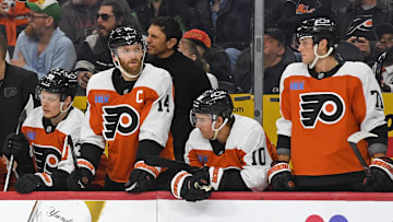 Apr 15, 2025; Philadelphia, Pennsylvania, USA; Philadelphia Flyers right wing Matvei Michkov (39), center Sean Couturier (14), right wing Bobby Brink (10) and right wing Tyson Foerster (71) watch the final seconds of loss to the Columbus Blue Jackets during the third period at Wells Fargo Center. 