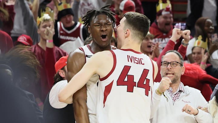 Jan 22, 2025; Fayetteville, Arkansas, USA; Arkansas Razorbacks forward Adou Thiero (3) celebrates with forward Zvonimir Ivisic (44) after a final basket at the end of the game against Georgia Bulldogs at Bud Walton Arena. Arkansas won 68-65. Mandatory Credit: Nelson Chenault-Imagn Images
