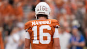 Texas Longhorns quarterback Arch Manning is among the 10 college football players dominating the NIL market in 2025.