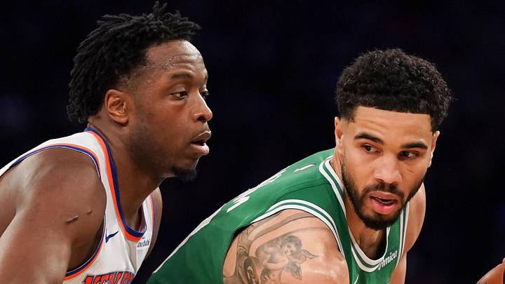 Apr 9, 2026; New York, New York, USA; New York Knicks forward OG Anunoby (8) defends Boston Celtics forward Jayson Tatum (0) during the fourth quarter at Madison Square Garden. Mandatory Credit: Lucas Boland-Imagn Images