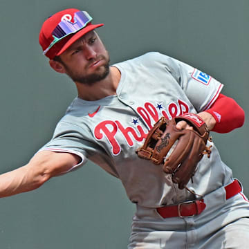 Aug 25, 2024; Kansas City, Missouri, USA;  Philadelphia Phillies shortstop Trea Turner (7) throws to second base for an out in the first inning against the Kansas City Royals at Kauffman Stadium