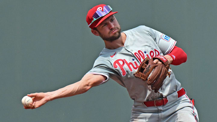 Aug 25, 2024; Kansas City, Missouri, USA;  Philadelphia Phillies shortstop Trea Turner (7) throws to second base for an out in the first inning against the Kansas City Royals at Kauffman Stadium