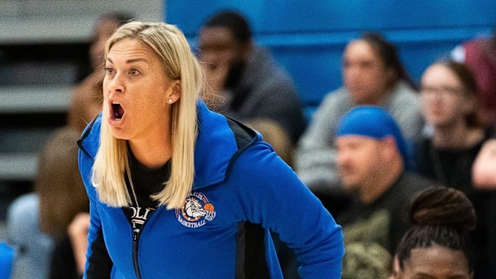 Bolles Bulldogs head coach Kelly Stevenson coaches from the sideline in the first half. The Rutherford Rams played the Bolles Bulldogs in the FHSAA Region 1-3A girls basketball final at Bolles School in Jacksonville, Fla. Friday night, February 21, 2025. Bolles defeated Rutherford 52-38. [Doug Engle/Florida Times-Union]2025
