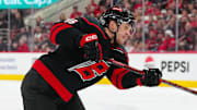 Mar 1, 2025; Raleigh, North Carolina, USA;  Carolina Hurricanes right wing Mikko Rantanen (96) takes a shot against the Edmonton Oilers during the third period at Lenovo Center. Mandatory Credit: James Guillory-Imagn Images