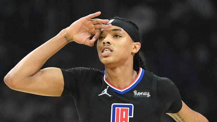 Los Angeles Clippers guard Brandon Boston Jr. (4) reacts after scoring a three point basket against the Boston Celtics during the first half at Staples Center on December 8, 2021.