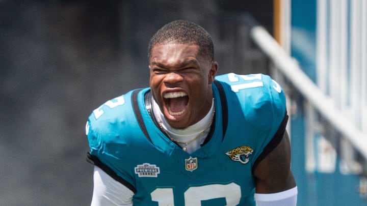 Jacksonville Jaguars wide receiver Travis Hunter (12) screams as he comes out of the tunnel before the start of an NFL football game between the Carolina Panthers at Jacksonville Jaguars at EverBank Stadium Sunday September 7, 2025. Jacksonville Jaguars wide receiver Travis Hunter (12) screams as he comes out of the tunnel before the start of an NFL football game between the Carolina Panthers at Jacksonville Jaguars at EverBank Stadium Sunday September 7, 2025.