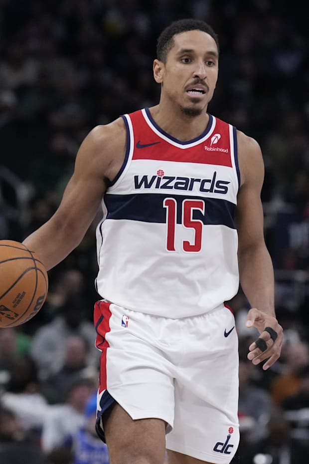 Washington Wizards guard Malcolm Brogdon brings the ball up the court against the Milwaukee Bucks