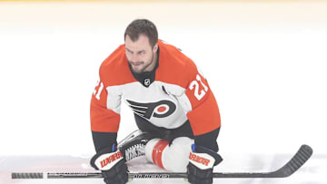 Feb 27, 2025; Pittsburgh, Pennsylvania, USA;  Philadelphia Flyers center Scott Laughton (21) warms up against the Pittsburgh Penguins at PPG Paints Arena. Mandatory Credit: Charles LeClaire-Imagn Images