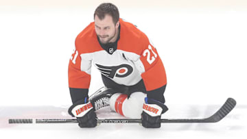 Feb 27, 2025; Pittsburgh, Pennsylvania, USA;  Philadelphia Flyers center Scott Laughton (21) warms up against the Pittsburgh Penguins at PPG Paints Arena. Mandatory Credit: Charles LeClaire-Imagn Images