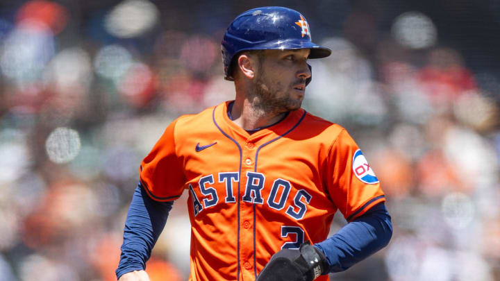 Jun 12, 2024; San Francisco, California, USA;  Houston Astros third base Alex Bregman (2) comes home to score during the sixth inning against the San Francisco Giants at Oracle Park.