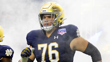 Jan 1, 2022; Glendale, Arizona, USA; Notre Dame Fighting Irish offensive lineman Joe Alt (76) against the Oklahoma State Cowboys in the 2022 Fiesta Bowl at State Farm Stadium.