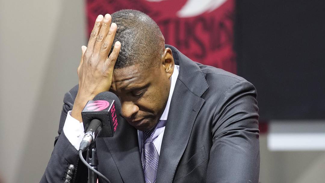 Sep 30, 2024; Toronto, Ontario, Canada; Toronto Raptors Vice-Chairman and Team President Masai Ujiri reacts while talking to the media about the passing of Dikembe Mutombo (not pictured) during media day at Scotiabank Area. Mandatory Credit: John E. Sokolowski-Imagn Images