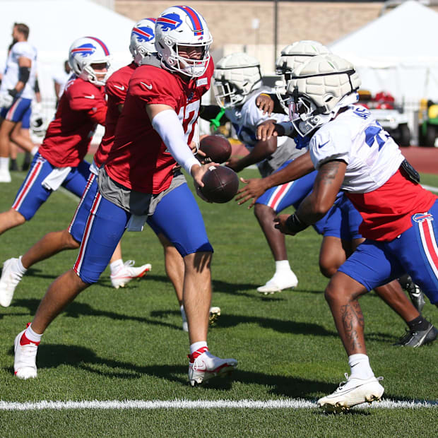 Josh Allen hands off Josh Allen hands off