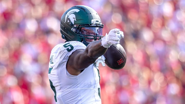 Oct 4, 2025; Lincoln, Nebraska, USA; Michigan State Spartans linebacker Jordan Hall (5) celebrates after an interception during the game against Nebraska at Memorial Stadium.