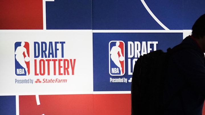May 12, 2025; Chicago, Illinois, US; Andrew Kim of the Philadelphia 76ers videos during the 2025 NBA Draft Lottery at McCormick Place. Mandatory Credit: David Banks-Imagn Images