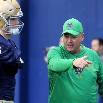Notre Dame Offensive Coordinator Mike Denbrock talks to players at Notre Dame spring football practice Thursday, March 7, 2024, at the Irish Athletics Center in South Bend.